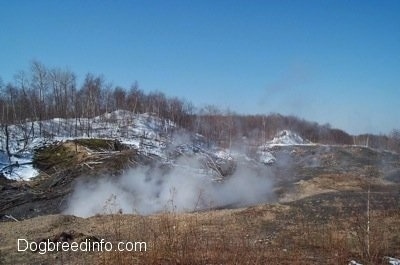 Steam coming from the outside of a hill