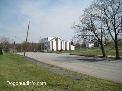 A house in Centralia, Pa with cars in front of it