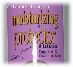 The label of a bottle of moisturizer that reads - moisturizing coat protector & enhancer Super Skin & Coat Conditioner