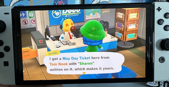 The game character Sharon at the airport talking to a dodo bird who runs the front desk