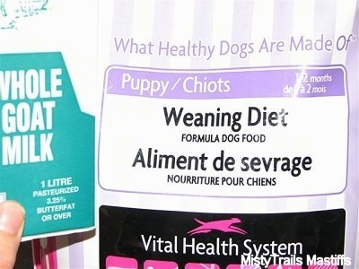 A bag of food used to Wean the puppies off of Formula and Goat Milk
