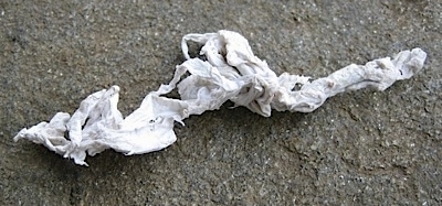 Close Up - A crumpled up napkin, which was taken out of the trashcan