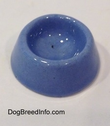 A ceramic blue dog bowl.