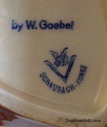 Close up - The underside of a fawn Boxer head wall mount. The logo of Goebel W. Germany is on it.