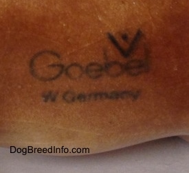 The underside of a Bull Terrier figurine that has the logo of Goebel W.Germany.