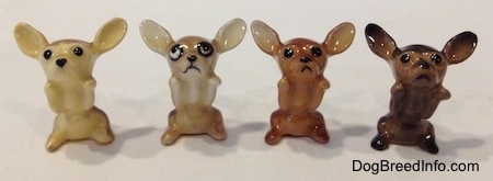 Four different variations of a Chihuahua figurine in a begging position.
