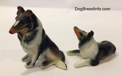 The left side of two bone china figurines that are both Rough Collies.