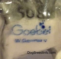 The underside of a Dandie Dinmont Terrier figurine. On the figurine is the text logo of Goebel W.Germnay and above it is an engraved number that reads - 508.