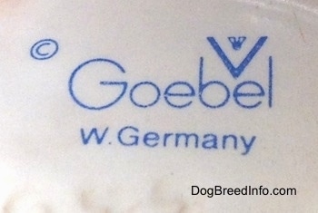 Close up - The underside of a English Springer Spaniel figurine and on it is the stamp of Goebel W.Germany.
