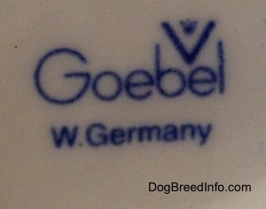 Close up - The Goebel W.Germany stamp is stamped on the underside of a figurine.