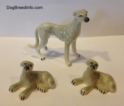 Vintage miniature bone China adult Greyhound with two puppies dog figurine family trio. 
