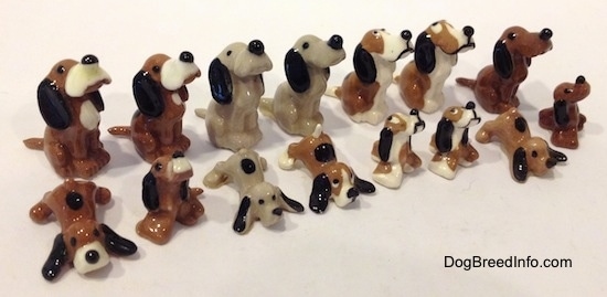 A collection of Hound dog figurines.