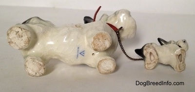 Vintage Goebel figurine set of an adult Miniature Schnauzer chained to its puppy