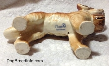 The underside of a Saint Bernard figurine. On the underside there is the stamp of Goebel W.Germany.